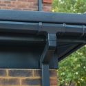 installing a flat roof gutter system