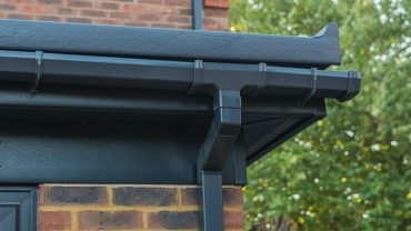 installing a flat roof gutter system