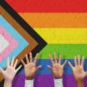mardi gras adopts progress pride flag